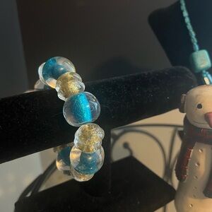 Bracelet Clear Resin with Dark Teal and Gold. NWOT